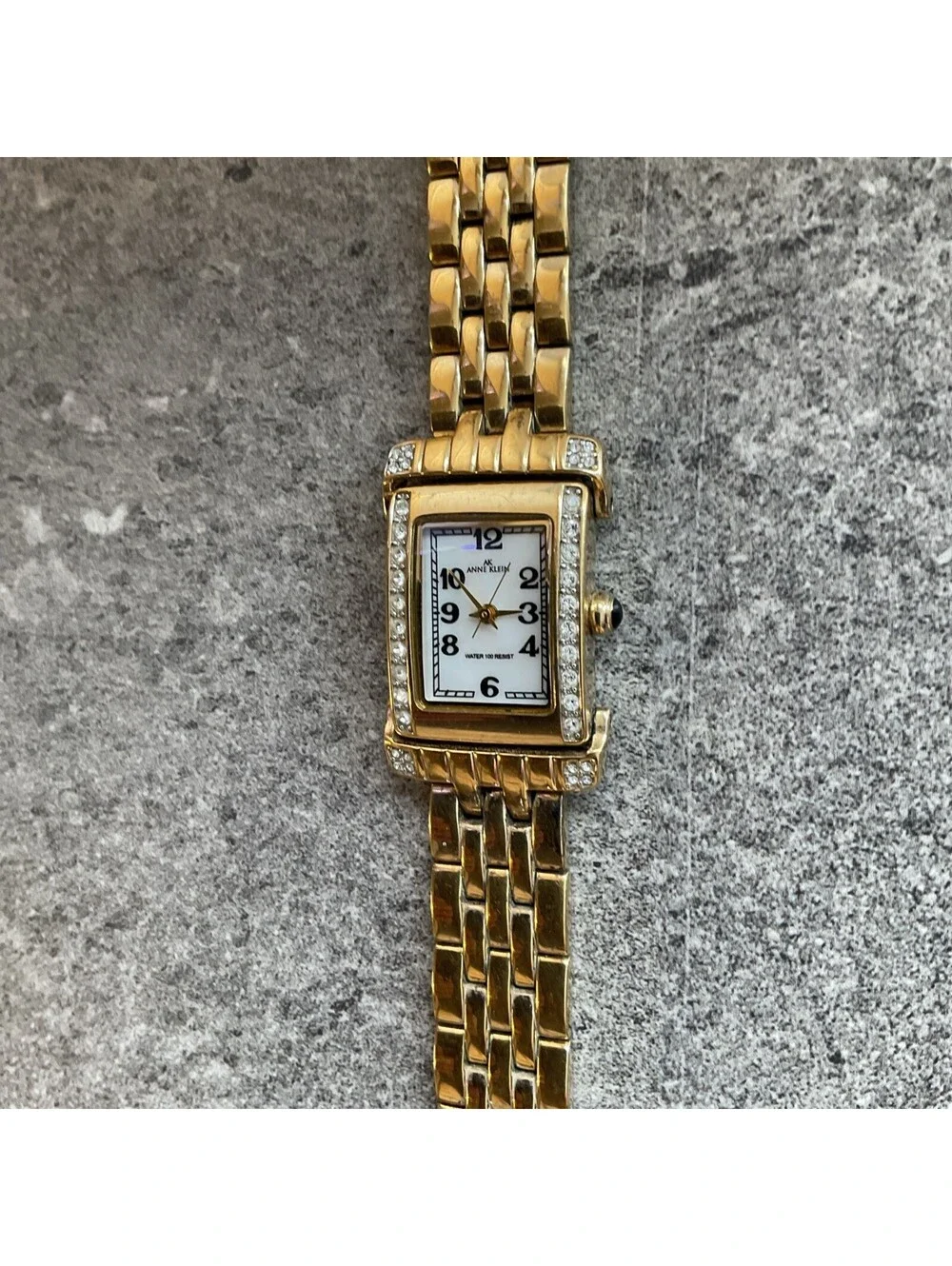 Anne Klein Womens Tank Style Watch 25mm Gold Tone Case & Band MOP Dial Bin O